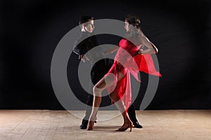 Latino dancers in ballroom