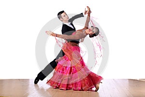 Latino dancers in ballroom