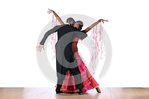 Latino dancers in ballroom