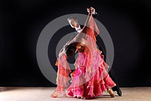 Latino dancers in ballroom