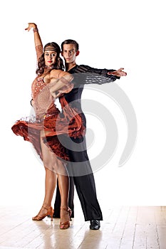 Latino dancers in ballroom