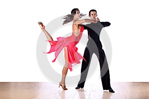 Latino dancers in ballroom