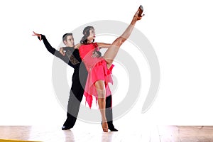 Latino dancers in ballroom