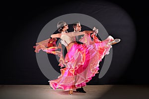 Latino dancers in ballroom