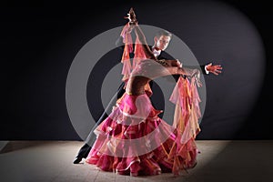 Latino dancers in ballroom