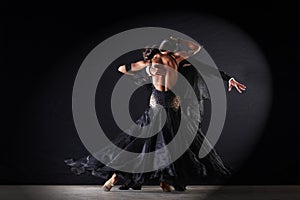 Latino dancers in ballroom