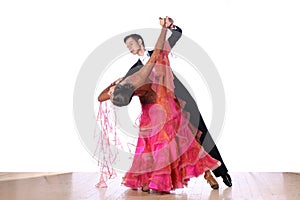 Latino dancers in ballroom