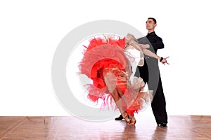 Latino dancers in ballroom