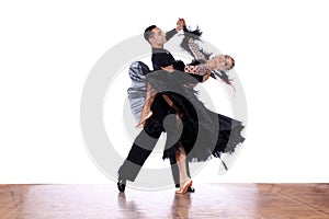 Latino dancers in ballroom