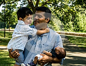 Latino father with his sons