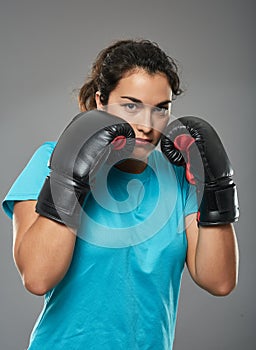 Latino female boxer in stance