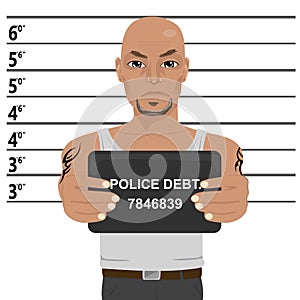 Latino gangster with tattoos holding mugshot