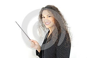 Latino Instructing in front of a white board.