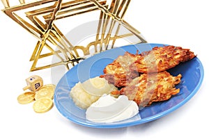 Latkes Menorah Dreidel and Gelt for Hanukkah photo