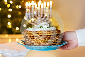 Latkes are traditional Hanukkah food dish made of crispy potato.