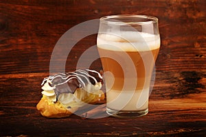 Latte macchiato and eclair