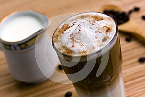 Latte Macchiato with frothy milk photo