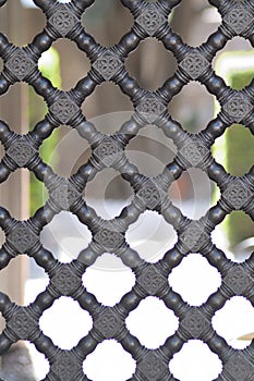 Lattice ancient wood door in Muslim palace of Nasrid style, Alcazaba, Malaga