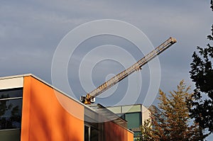 Lattice jib of construction crane over buildings