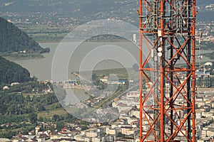 Lattice telecommunication tower above city