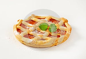 Lattice topped fruit tart crostata photo