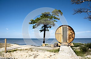 Latvia, Cape Kolka. House in the form of a barrel at the coast o