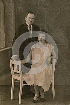 LATVIA- CIRCA 1920- 1925: Shot of married couple in studio, Vintage Carte de Viste Art Deco era photo