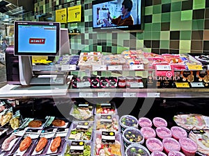 Culinary department with variety of products and electronic scales in Rimi Baltic hypermarket