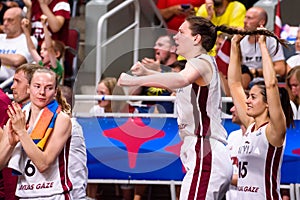 Latvian basketball players cheers up their teammates