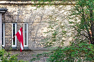 Latvian flag mourning those deported to Siberia in June.