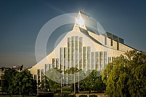 Latvian national library with light reflecting off it.