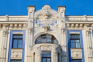 Latvian tourist landmark attraction - Art Nouveau architecture, building fasade of Riga city, Latvia photo