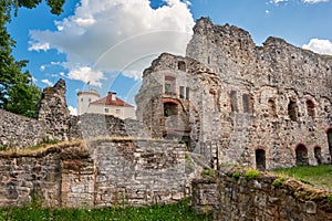 Latvian tourist landmark attraction - ruins of the medieval Livonian castle, old stone walls and towers in Cesis, Latvia