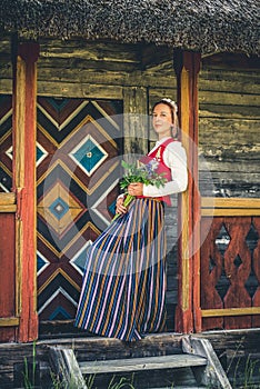 Latvian woman in traditional clothing. Ligo folk.