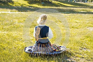 Latvian woman in traditional clothing. Ligo folk.