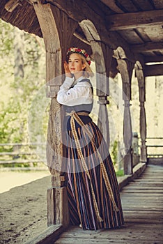 Latvian woman in traditional clothing. Ligo folk.