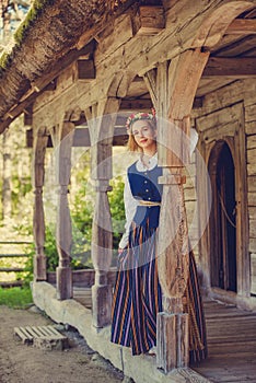 Latvian woman in traditional clothing. Ligo folk.