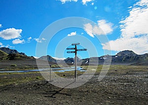 Laugavegur hiking trail marker signpost with directions to Emstrur-Botnar, Alftavatn, Hvanngil, Highlands of Iceland