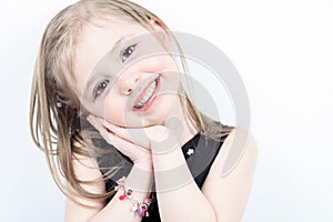 Laugh a little girl at the studio shooting