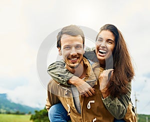 Laugh, love and piggyback with portrait of couple in nature for happy, smile and bonding. Happiness, relax and care with