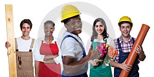 Laughing african american construction worker with group of other workers