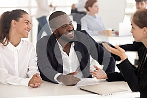 Laughing african american couple at meeting negotiation