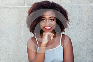 Laughing african american woman with typical afro hair