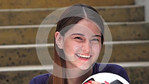 Laughing Athletic Teen Female Soccer Player