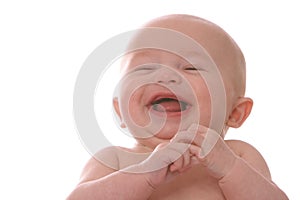 Laughing baby on blanket