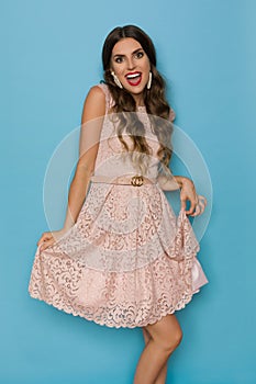 Laughing Beautiful Woman In Beige Elegant Lace Mini Dress