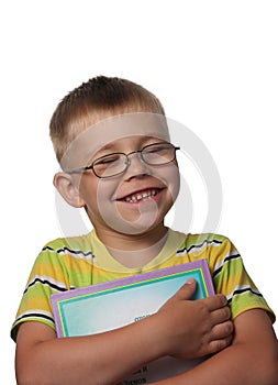 Laughing boy with book