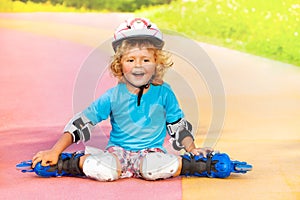 Laughing boy rest after skating