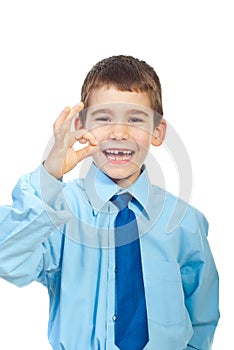 Laughing boy showing okay sign gesture