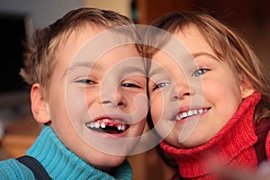 Laughing boy and smiling girl